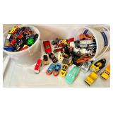 Large Collection of Diecast Toy Cars and Trucks with Storage Buckets