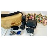 Vintage Camera Bag with Polaroid Spectra SE, Lenses, Flashes, and Photo Frame Collection