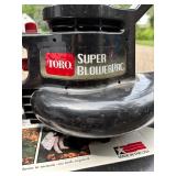 Toro Super Blower Vac Model 51582 Bundle with Melnor Sprinkler and Garden Tools