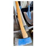 Collection of Garden Tools Including Shovels, Axe, Hoes, Brooms, and Pitchfork