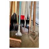 Collection of Garden Tools Including Shovels, Axe, Hoes, Brooms, and Pitchfork