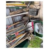 Collection of Garden and Yard Tools including Shovels, Rakes, and Hoes