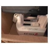 Box of External Hard Drive Docks, DVD Drive, and Accessories