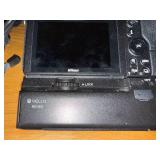 Nikon Camera with Laowa Lens, Vello BG-N21 Grip, Case, and Accessories