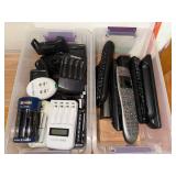 Collection of Remote Controls and Battery Chargers with Charging Docks