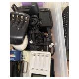 Collection of Remote Controls and Battery Chargers with Charging Docks