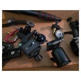 Collection of Camera Mounts, Clamps, and Extendable Monopod