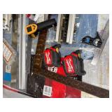 Collection of Measuring Tools, Clamps, and Hand Tools Including Tape Measures and Squares