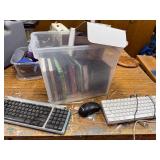 Electronics Lot with Nikon Coolpix Camera, 2 USB Keyboards, and Mixed DVD Collection