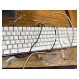 Electronics Lot with Nikon Coolpix Camera, 2 USB Keyboards, and Mixed DVD Collection