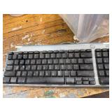 Electronics Lot with Nikon Coolpix Camera, 2 USB Keyboards, and Mixed DVD Collection