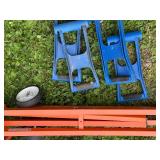 PortaMate Folding Saw Table with 4 blue panel carriers