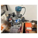 Makita Wood Router with Adjustable Base and Handles