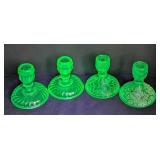 Two Sets of Uranium Glass Candleholders
