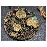 Collection of Vintage Jewelry with Floral and Gemstone Designs