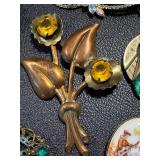 Collection of Vintage Jewelry with Floral and Gemstone Designs