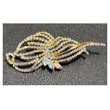 Collection of Vintage Jewelry with Floral and Gemstone Designs