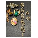 Collection of Vintage Jewelry with Floral and Gemstone Designs
