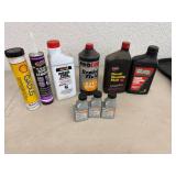 Assortment of Full Oil Bottles, Grease