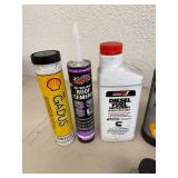 Assortment of Full Oil Bottles, Grease