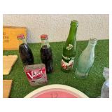 Mixed Collectibles - Bobcat Clock, Soda Bottles, Velvet Tin