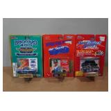 *3* Racing Champions Super Truck Die Casts/Collectors Cards with Stand