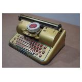 Vintage Berwin Gold Tin Typewriter
