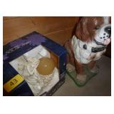 a very heavy concrete dog statue and solar fairy a very heavy concrete dog statue and solar fairy