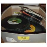 Box full of 45 rpm records Box full of 45 rpm records