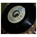 Box full of 45 rpm records Box full of 45 rpm records