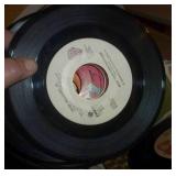 Box full of 45 rpm records Box full of 45 rpm records