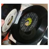 Box full of 45 rpm records Box full of 45 rpm records