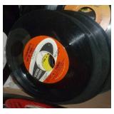 Box full of 45 rpm records Box full of 45 rpm records