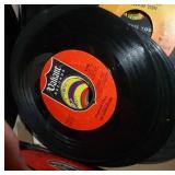 Box full of 45 rpm records Box full of 45 rpm records