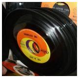 Box full of 45 rpm records Box full of 45 rpm records