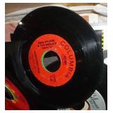 Box full of 45 rpm records Box full of 45 rpm records