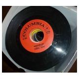 Box full of 45 rpm records must be close to 100 Box full of 45 rpm records must be close to 100