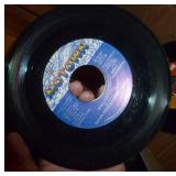 Box full of 45 rpm records must be close to 100 Box full of 45 rpm records must be close to 100