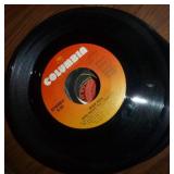 Box full of 45 rpm records must be close to 100 Box full of 45 rpm records must be close to 100