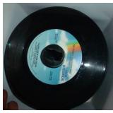 Box full of 45 rpm records must be close to 100 Box full of 45 rpm records must be close to 100