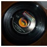 Box full of 45 rpm records must be close to 100 Box full of 45 rpm records must be close to 100