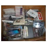 Box full of cassettes and some CDs Box full of cassettes and some CDs