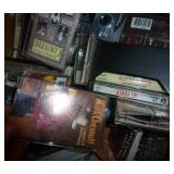 Box full of cassettes and some CDs Box full of cassettes and some CDs