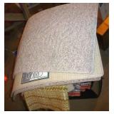 Group of throw rugs Group of throw rugs