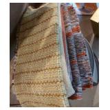 Group of throw rugs Group of throw rugs