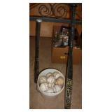 Twins memorabilia, bucket of baseballs, 2 bats Twins memorabilia, bucket of baseballs, 2 bats