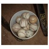 Twins memorabilia, bucket of baseballs, 2 bats Twins memorabilia, bucket of baseballs, 2 bats