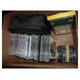 Box of music cds and a camping light Box of music cds and a camping light