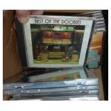 Box of music cds and a camping light Box of music cds and a camping light