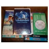 Box of VHS including Disney and some 8 track tapes Box of VHS including Disney and some 8 track tapes